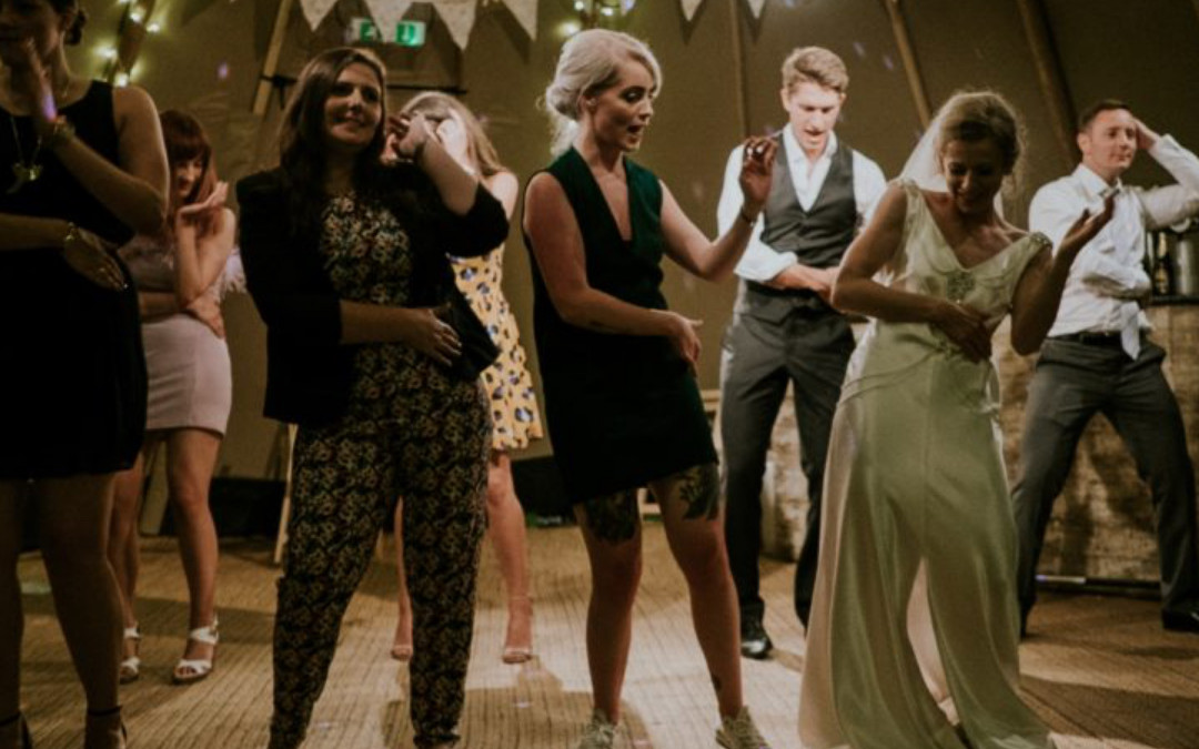 The Ultimate Upbeat Wedding Entrance Songs To Kick Off Your Reception